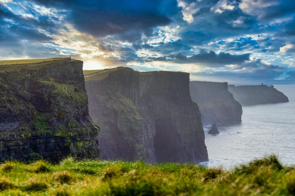 pexels photo 4055520 4055520 Experience the breathtaking Cliffs of Moher along Ireland's rugged coast at sunrise.